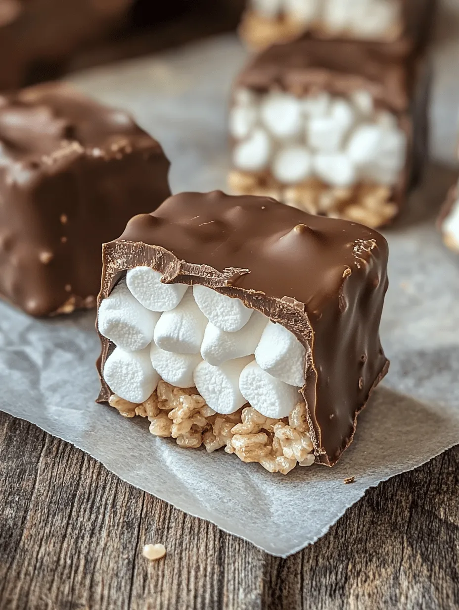 Scotchmallows are a beloved treat that marries the delightful textures of chewy marshmallows and crunchy cereal with the rich taste of chocolate. This nostalgic dessert has a special place in the hearts of many, evoking memories of childhood candy-making adventures and sweet indulgences. The combination of textures—the soft, gooey marshmallows contrasted by the crispiness of rice cereal—creates a unique experience that is both satisfying and comforting.
