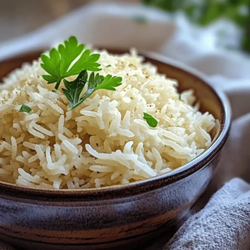 Savory Rice With Cream is a delightful dish that elegantly marries the richness of spices with the creamy textures of heavy cream and Parmesan cheese. This recipe is not only straightforward to prepare but also versatile enough to serve as a hearty side dish or a satisfying main course. Its roots can be traced back to various culinary traditions, making it an intriguing addition to any meal. With its comforting flavors and creamy finish, it's no wonder that Savory Rice With Cream has garnered a loyal following among home cooks and food enthusiasts alike.