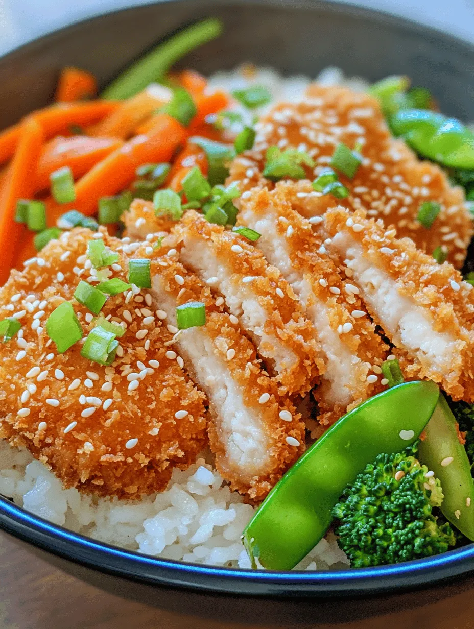 Crispy Katsu Bowls are a delightful fusion of flavors and textures that effortlessly transport you to the bustling streets of Japan. This dish features golden-brown pork cutlets, known as katsu, paired with a rich homemade tonkatsu sauce, served over a bed of fluffy rice and vibrant vegetables. Katsu, which translates to "cutlet" in Japanese, is a beloved staple in Japanese cuisine, cherished for its satisfying crunch and savory taste.