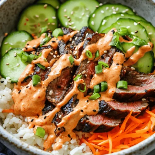 Korean cuisine has garnered immense popularity worldwide, renowned for its dynamic flavors, rich textures, and colorful presentations. This culinary tradition beautifully blends spicy, sweet, and savory elements, making it a favorite among food enthusiasts. One standout dish that encapsulates the essence of Korean flavors is the Korean BBQ Steak Rice Bowl with Spicy Cream Sauce. This dish not only celebrates the vibrant taste of marinated steak but also brings together a medley of fresh vegetables and aromatic rice, all topped with a luscious sauce that adds a unique twist.